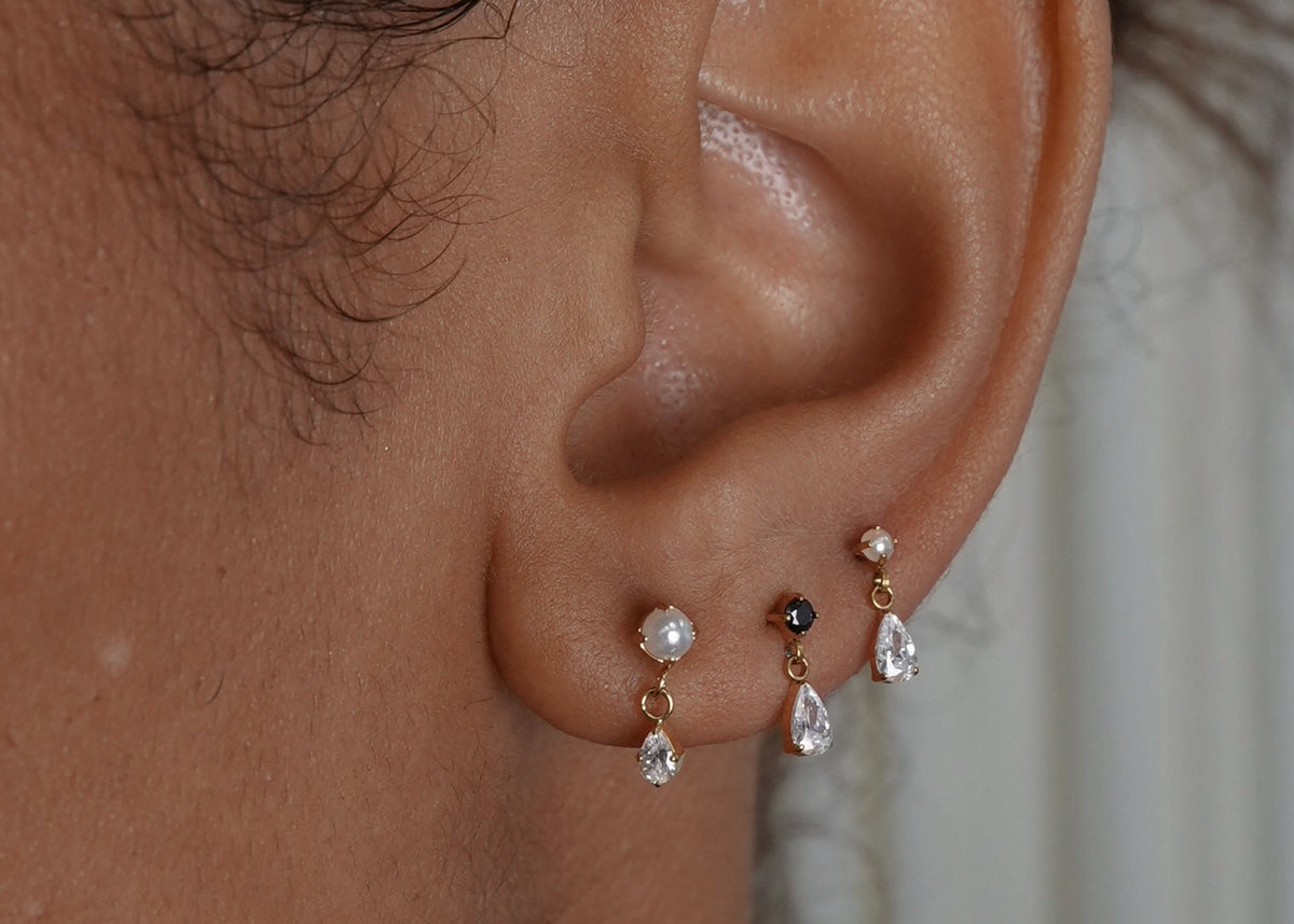 Model wearing Tinilux earrings