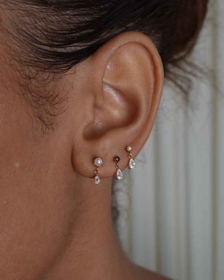 Model wearing Tinilux earrings