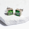 emerald green titanium stud earrings made with medical grade titanium