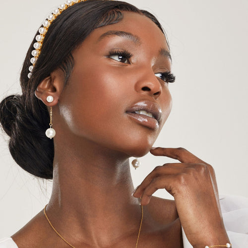 girl wearing hypoallergenic pearl drop wedding earrings ||all