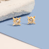 gold hypoallergenic stud earrings with clear gemstone