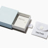 tini lux light blue and white sustainable packaging 